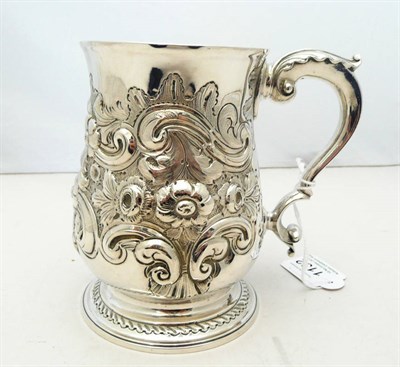 Lot 1132 - A George III Mug, Walter Brind, London 1785, of baluster form with leaf capped scroll handle, later