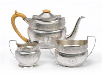 Lot 1133 - A George III Three Piece Teaset, Alexander Field, London 1802/4, the baluster oval body with an...