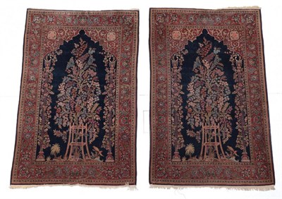 Lot 658 - Pair of Kashan Prayer Rugs Central Iran, circa 1930 Each with a deep indigo field and tree in bloom
