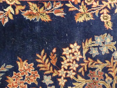 Lot 658 - Pair of Kashan Prayer Rugs Central Iran, circa 1930 Each with a deep indigo field and tree in bloom