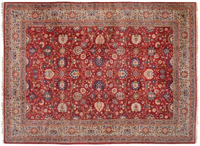 Lot 663 - Kashan Carpet Central Iran, circa 1950 The crimson field with an all over design of scrolling vines