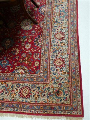 Lot 663 - Kashan Carpet Central Iran, circa 1950 The crimson field with an all over design of scrolling vines