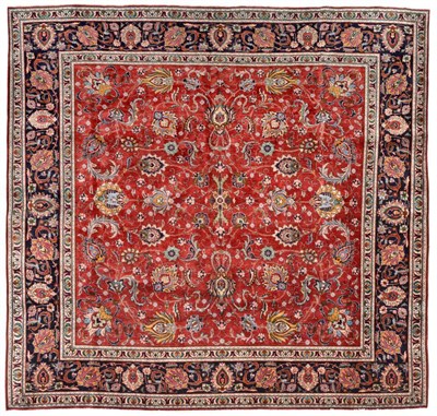 Lot 667 - Tabriz Carpet of unusual size North West Iran, circa 1950 The blood red field with an allover...