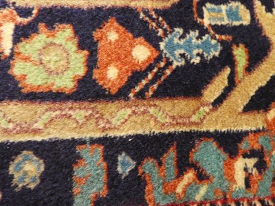Lot 677 - Tabriz Carpet of Mustafi design Iranian Azerbaijan, circa 1950 The indigo field of plants and...