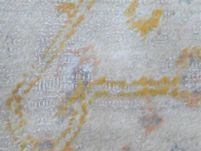 Lot 679 - Anatolian Carpet Possibly Borlu, circa 1900 The ivory field with three medallions framed by...