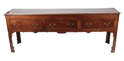 Lot 686 - An Early 18th Century Oak Low Dresser, the moulded top with three boards above three frieze...
