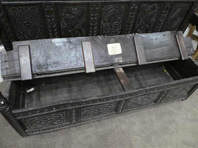 Lot 687 - A 17th Century Joined Oak Settle, named and dated Thomas Reresby 1621, the back support carved with