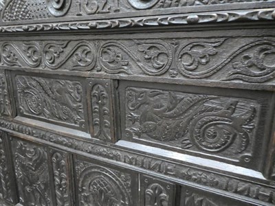 Lot 687 - A 17th Century Joined Oak Settle, named and dated Thomas Reresby 1621, the back support carved with