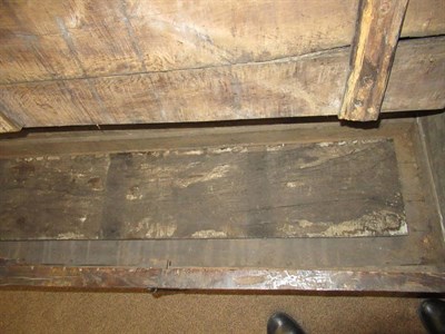Lot 688 - A Joined Oak Settle, late 17th/18th century, the back support carved in relief with five panels...