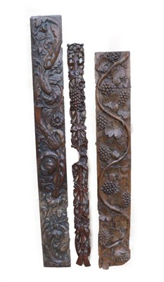 Lot 695 - A 17th Century Rectangular Carved Oak Panel, of scrolling vine leaves with grapes, 122cm by 18cm; A
