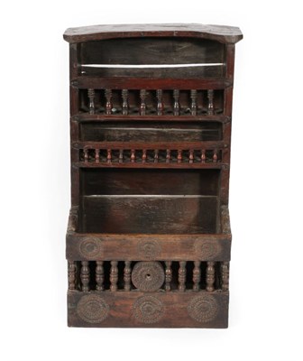 Lot 706 - A 17th Century Joined Oak and Fruitwood Mural Livery Cupboard, with domed top above two shelves...