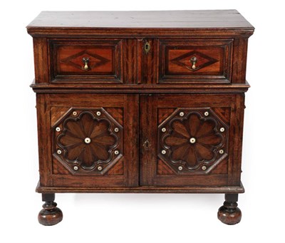 Lot 709 - An Oak Parquetry Decorated and Ivory Mounted Chest of Drawers, circa 1680, in two sections, the...