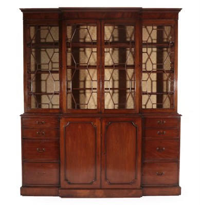 Lot 716 - A Late George III Mahogany Library Bookcase, early 19th century, the dentil cornice above four...