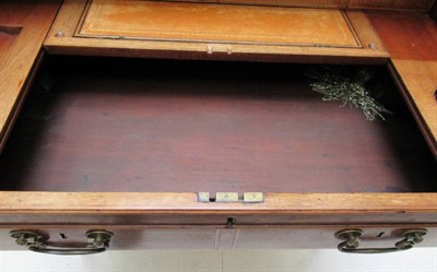 Lot 722 - A Late George III Mahogany and Ebony Strung Rolltop Desk, early 19th century, the sliding...