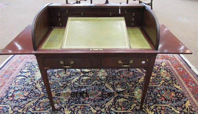 Lot 729 - A George III Mahogany Tambour Roll-Top Desk, late 18th century, the interior with two candle slides