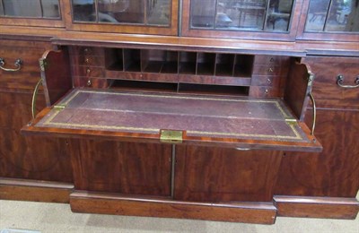 Lot 734 - A Late George III Mahogany and Ebony Strung Breakfront Library Bookcase, early 19th century, in...