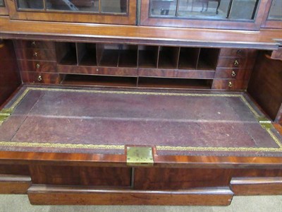 Lot 734 - A Late George III Mahogany and Ebony Strung Breakfront Library Bookcase, early 19th century, in...