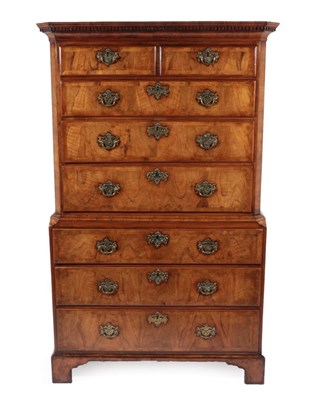 Lot 741 - A Walnut and Crossbanded Chest on Chest, circa 1740, the dentil cornice above two short and...