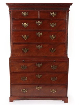 Lot 765 - ~ A George III Mahogany Chest on Chest, late 18th century, with a Greek Key dentil cornice...