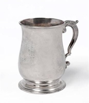 Lot 1144 - A George II Mug, William Shaw II, London 1749, of baluster form with leaf capped scroll handle,...