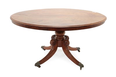 Lot 775 - ~ A George IV Mahogany Breakfast Table, circa 1825, the oval moulded top above a baluster...