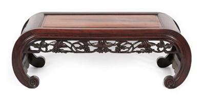 Lot 789 - A 19th Century Chinese Hardwood Opium Table, the moulded rectangular top above a foliate carved...