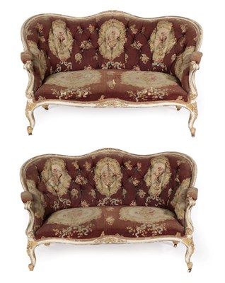 Lot 795 - A Pair of Louis XV Style Carved Giltwood and Cream Painted Canapes, circa 1880, of serpentine...