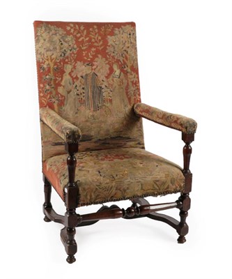 Lot 798 - A late 17th Century Walnut Framed Armchair, recovered in close-nailed needlework fabric with...