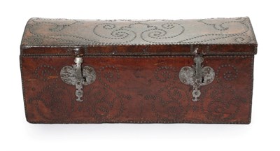 Lot 799 - A George III Trunk, mid 18th century, covered in dark brown leather with decorative brass studding