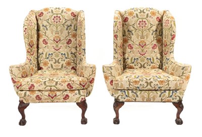 Lot 800 - A Pair of Early Georgian Style Mahogany Framed Armchairs, 20th century, upholstered in green floral