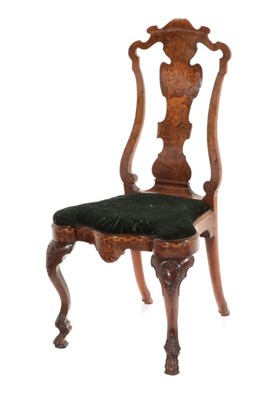 Lot 812 - ~ An 18th Century Continental Figured Walnut and Marquetry Inlaid Side Chair, the carved splat...