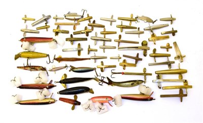 Lot 2024 - A collection of vintage fishing lures, unnamed, including approx. forty brass and other metal...