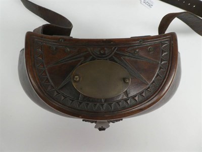 Lot 2025 - A good 18th century leather pot-bellied fishing creel, the hinged cover tooled with a sunburst...