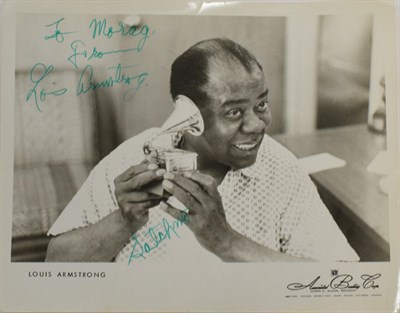 Lot 2070 - Louis Armstrong Autographed Photograph black and white, hand signed 'To Morag from Louis...
