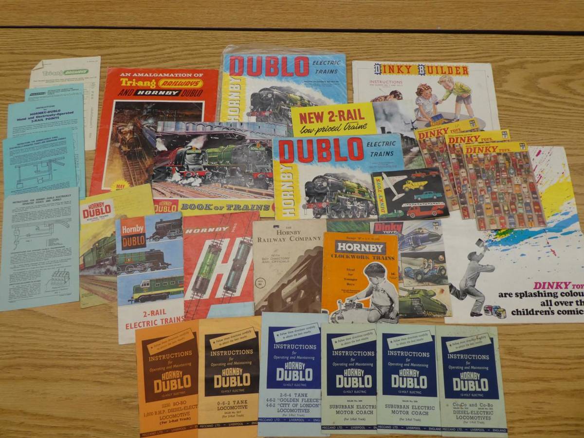 Lot 2167 - Hornby Dublo Catalogues 1964 with Suburban and E3002 train sets, 1964 (?) 2nd Edition, 2x1961...