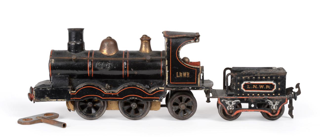 Lot 2211 - Marklin O Gauge 1020 C/w 0-4-2 LNWR Locomotive and 4-Wheel Tender finished in black with red lining