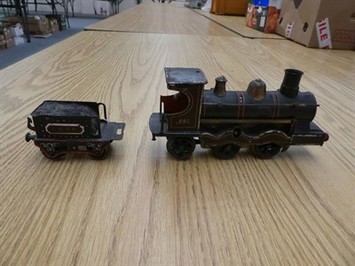 Lot 2211 - Marklin O Gauge 1020 C/w 0-4-2 LNWR Locomotive and 4-Wheel Tender finished in black with red lining