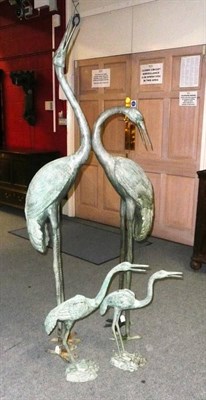 Lot 1180 - A Pair of Bronzed Metal Life Size Models of Manchurian Cranes, modern, 186cm and 145cm high;...