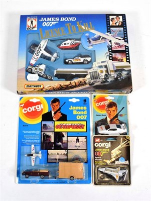 Lot 2368 - Corgi Junior James Bond Moonraker Space Shuttle, Octopussy Car, trailer and aircraft set (both...