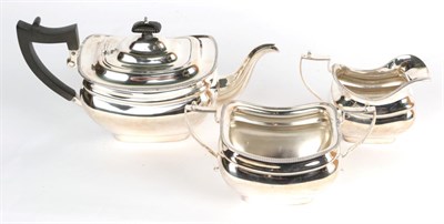 Lot 3 - Three piece silver tea service by Jackson & Fullerton, London 1909, retailed by Mackay and...
