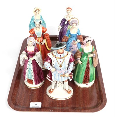 Lot 9 - A group of seven Sitzendorf figures, Henry VIII and his six wives