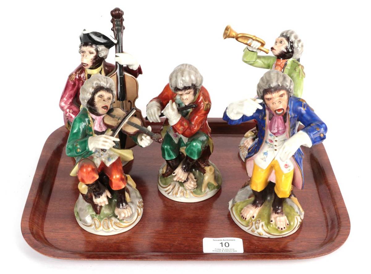 Lot 10 - A set of late 19th century Dresden monkey band figures (5)