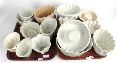Lot 35 - ^ Two trays of Victorian and later ceramic jelly moulds