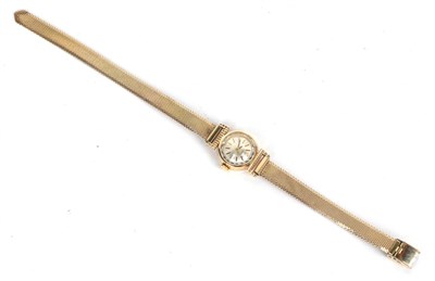 Lot 49 - A lady's 14 carat gold wristwatch, signed Tissot, with attached plated bracelet