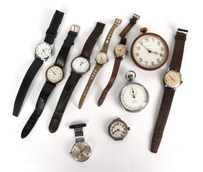 Lot 64 - A selection of watches comprising of, nickel cased Omega stopwatch, 8-day travel timepiece retailed