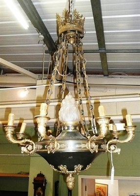 Lot 1202 - A Gilt Brass Eight-Branch Ceiling Light, in Regency style, the central green painted compressed...