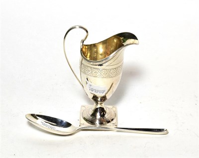 Lot 92 - An 18th century silver marrow spoon, marks indistinct London circa 1770; and a helmet shaped...