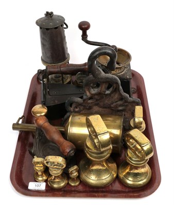 Lot 107 - ^ A tray including brass meat spit; brass weights; miner's lamp; coffee grinder; and a cast...