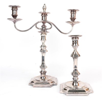 Lot 112 - A silver plated three light candelabra and matching silver candlestick