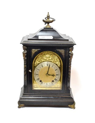 Lot 141 - A Victorian quarter striking ebonised table clock, movement back plate stamped W&H, quarter...